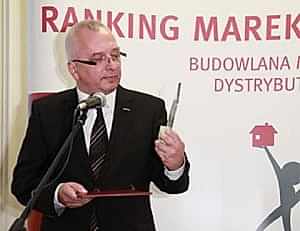 Paweł Muszyński z firmy Fakro z nagrodą - Złotą Budowlaną Markę Roku 2012 w kategorii Okna Dachowe